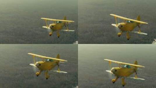 空中飞行的双翼机高清在线视频素材下载