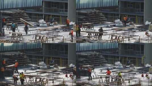 建筑工地工人正在建造摩天大楼延时拍摄高清在线视频素材下载