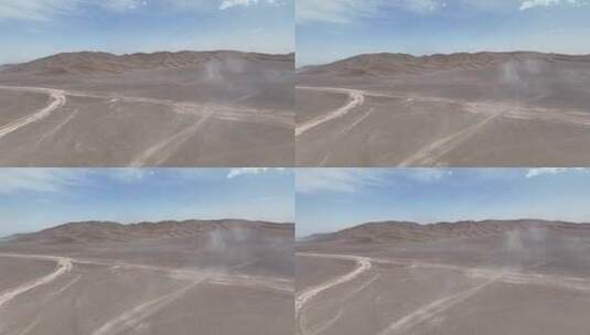 4k航拍沙漠戈壁中行驶的车高清在线视频素材下载