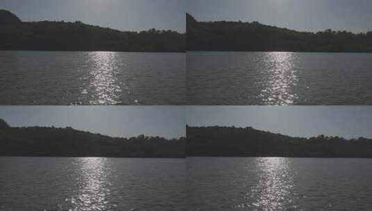 阳光下波光粼粼的湖面高清在线视频素材下载