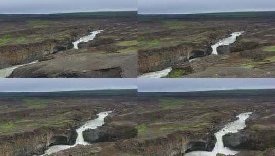 冰岛。从无人机上观看峡谷中的河流和瀑布。冰岛白天的风景。高清在线视频素材下载