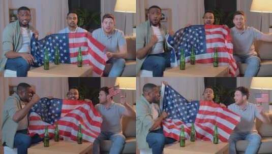 有美国国旗的朋友晚上看电视高清在线视频素材下载