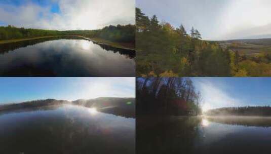 秋天湖泊森林太阳雾气湖面水天一色高清在线视频素材下载
