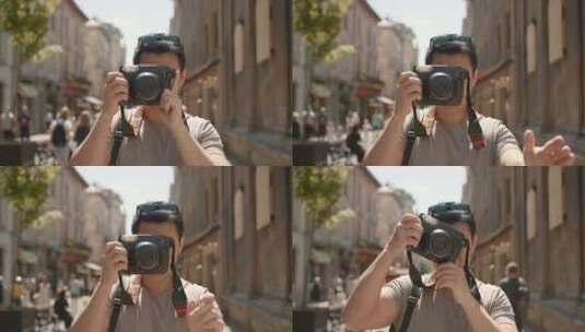 男摄影师用数码相机拍摄高清在线视频素材下载