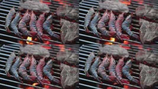 在烤肉架上烤肉烤牛肉虾肉慢镜头高清在线视频素材下载
