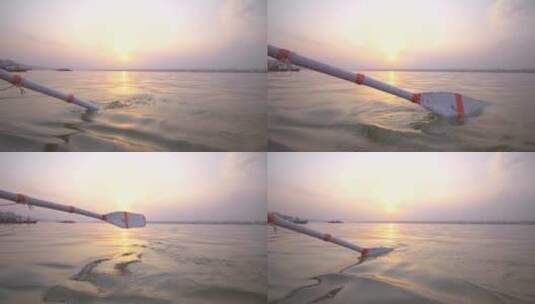 日落时划动的船桨高清在线视频素材下载