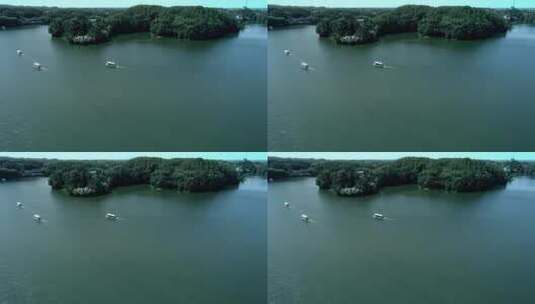 高清航拍湖泊唯美风景船汽艇划船黑龙滩高清在线视频素材下载