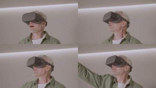 戴虚拟现实眼镜的老年人高清在线视频素材下载