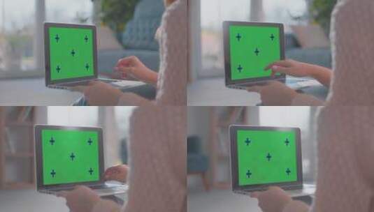 使用绿屏笔记本电脑的女人高清在线视频素材下载