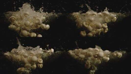 白蘑菇掉进水里高清在线视频素材下载