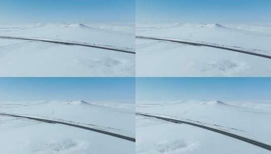 内蒙古呼伦贝尔雪原公路自然风光航拍高清在线视频素材下载