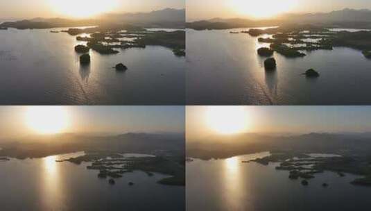 清晨日出湖中小岛渔村唯美逆光航拍高清在线视频素材下载