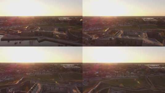 佛罗里达州圣奥古斯丁卡斯蒂略圣马科斯堡历史地标上空的空中视频日落高清在线视频素材下载