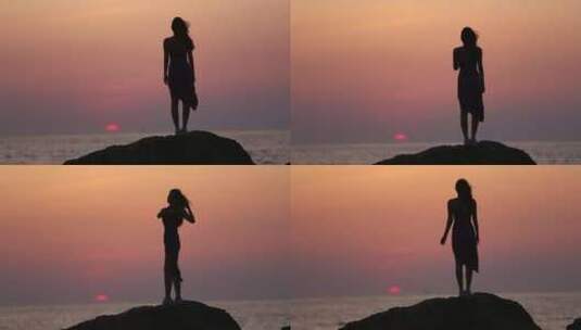 山东烟台夕阳落日下，大海边跳舞的女孩剪影高清在线视频素材下载