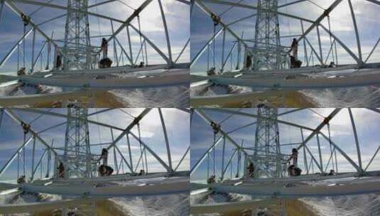 4K西藏5200米雪山铁塔组立施工横担吊装10高清在线视频素材下载