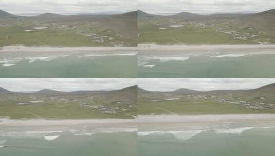 爱尔兰共和国阿基尔岛上龙骨海滩和村庄的宁静鸟瞰。高清在线视频素材下载
