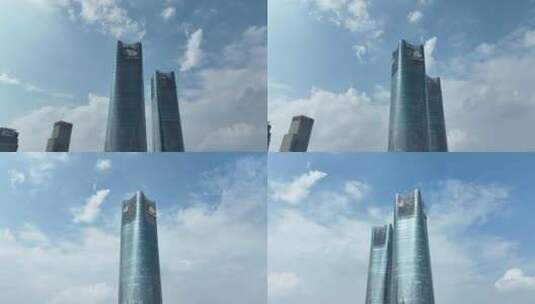 南昌绿地集团双子塔仰拍高楼大厦蓝天白云高清在线视频素材下载