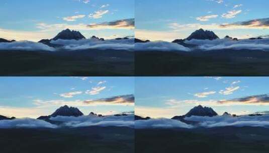 航拍川西清晨云海中的雅拉雪山高清在线视频素材下载