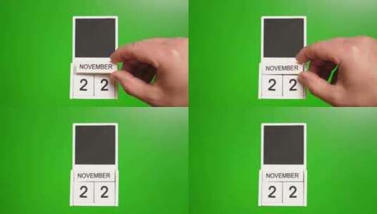 11.绿色背景上日期为11月22日的日历高清在线视频素材下载