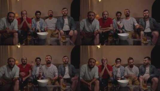 一群男性朋友观看一场因失败而心烦意乱的足高清在线视频素材下载