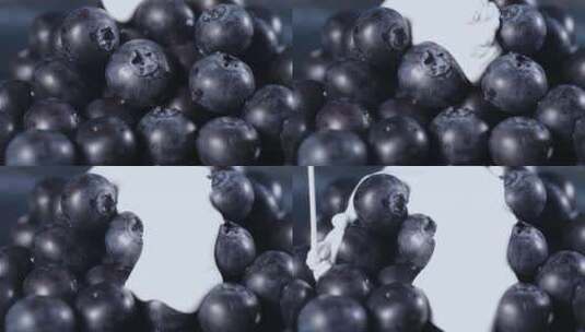 酸奶覆盖在蓝莓上高清在线视频素材下载