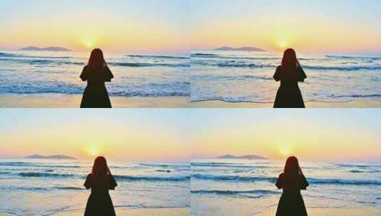 海南三亚海棠湾漂亮女孩在沙滩拍摄日出背影高清在线视频素材下载