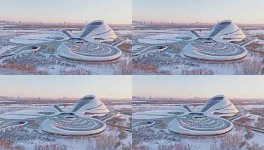 中国黑龙江哈尔滨大剧院雪景航拍高清在线视频素材下载