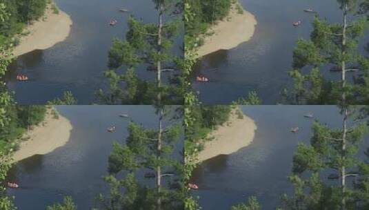 大兴安岭游客在河流乘坐橡皮船漂流高清在线视频素材下载