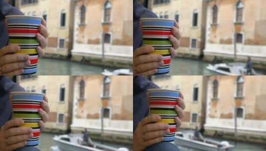 在威尼斯的河边品尝一杯茶高清在线视频素材下载
