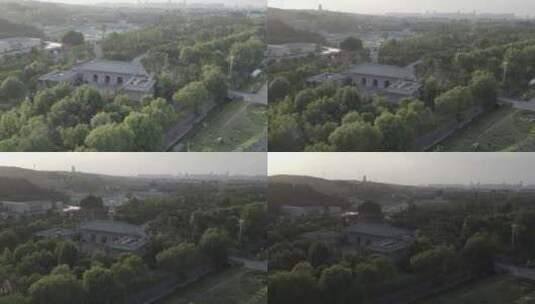 洛阳龙门龙门石窟伊河古街古建筑航拍高清在线视频素材下载