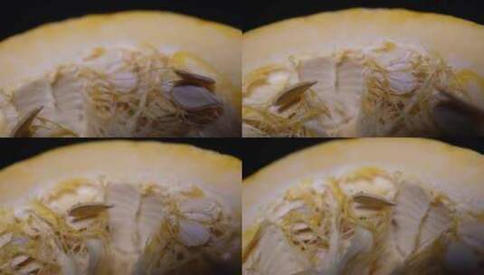 切开的小黄金贝贝南瓜籽南瓜瓤高清在线视频素材下载