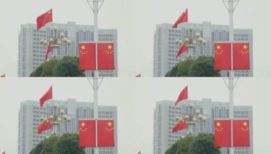 4k升格拍摄迎接国庆五星红旗飘扬高清在线视频素材下载