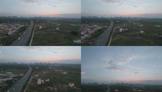 广西高速公路黄昏时沿途村庄高清在线视频素材下载
