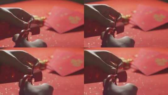 亚洲中国母子春节剪纸剪窗花红纸高清在线视频素材下载