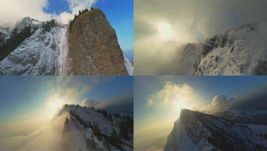 航拍雪山阳光穿过雪山高清在线视频素材下载