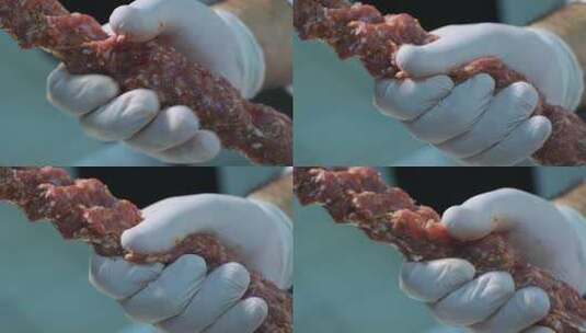 厨师在烤肉串上做烤肉串高清在线视频素材下载