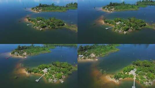 无人机飞越一个小岛高清在线视频素材下载