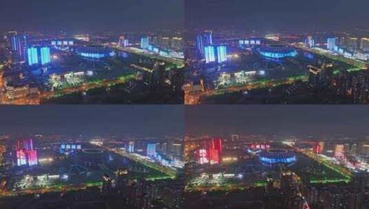 航拍天津奥林匹克中心体育场夜景灯光秀高清在线视频素材下载