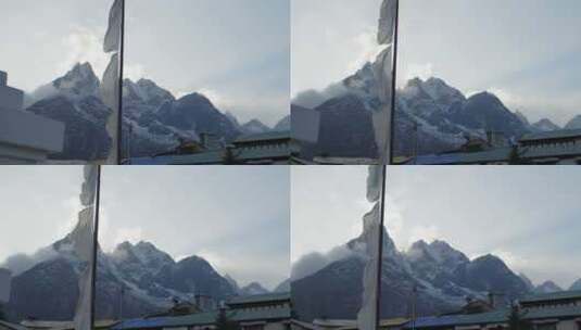 滑翔的喜马拉雅山，祈祷旗在风中飘扬。高清在线视频素材下载