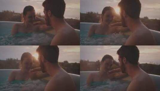恋爱中的情侣在热水浴缸里聊天高清在线视频素材下载