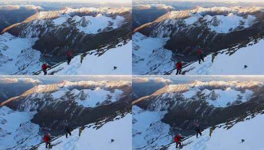 攀登四川岷山山脉主峰雪宝顶的登山者高清在线视频素材下载