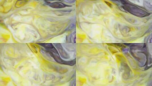 黄色和紫色墨水在水中扩散高清在线视频素材下载