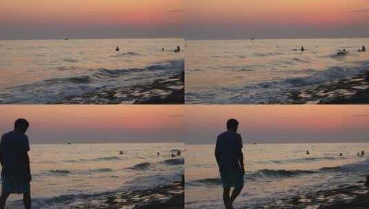 黄昏在海边行走的男士高清在线视频素材下载