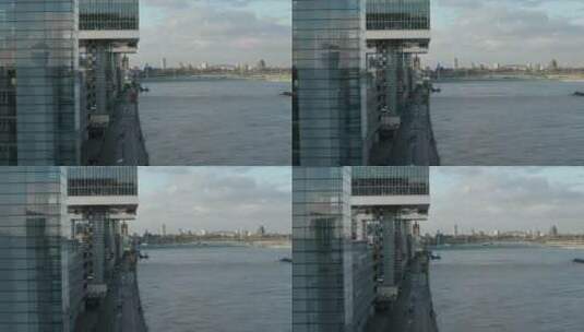 有写字楼的城市中的河岸高清在线视频素材下载