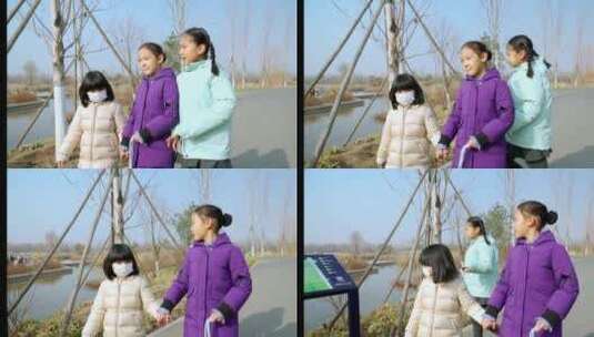 冬天在公园游玩的亚洲女孩高清在线视频素材下载