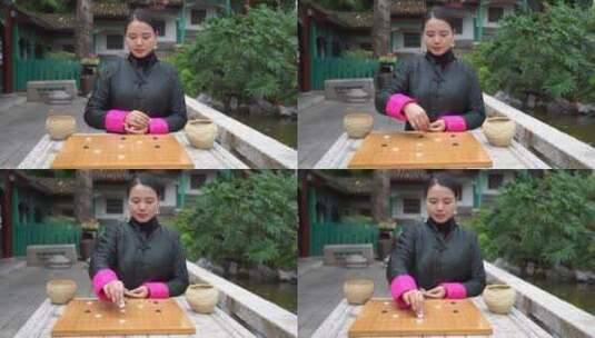 中式四合院女人下棋高清在线视频素材下载