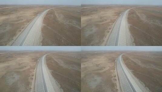 新疆环塔克拉玛干沙漠和若铁路航拍高清在线视频素材下载