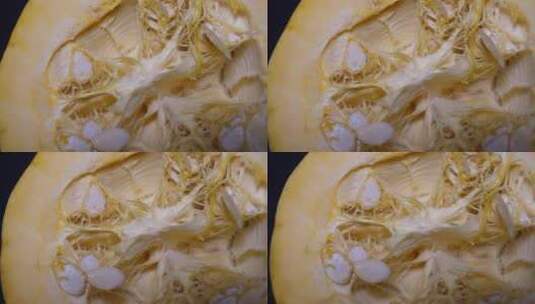 切开的小黄金贝贝南瓜籽南瓜瓤高清在线视频素材下载