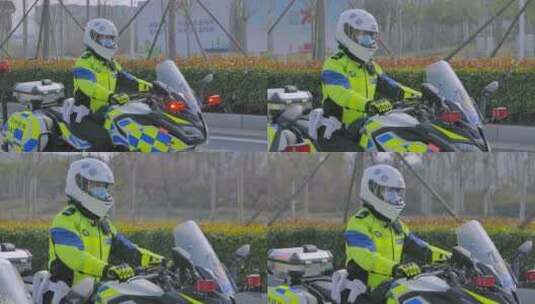 骑摩托车的交警白天路面执勤高清在线视频素材下载