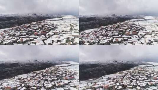 航拍白雪覆盖的村庄高清在线视频素材下载